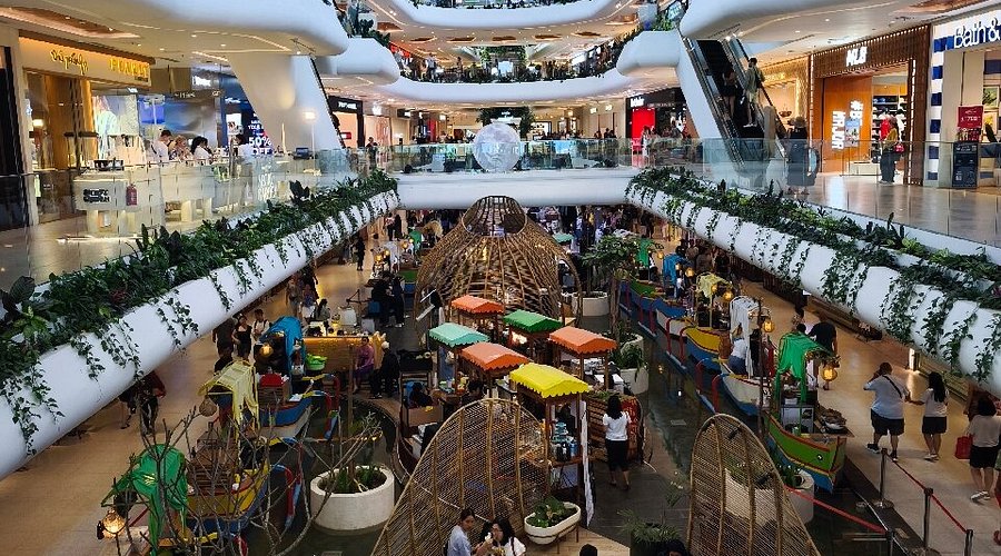 Floating Market at Icon Bali Mall with boats, food stalls, and waterfront walkways