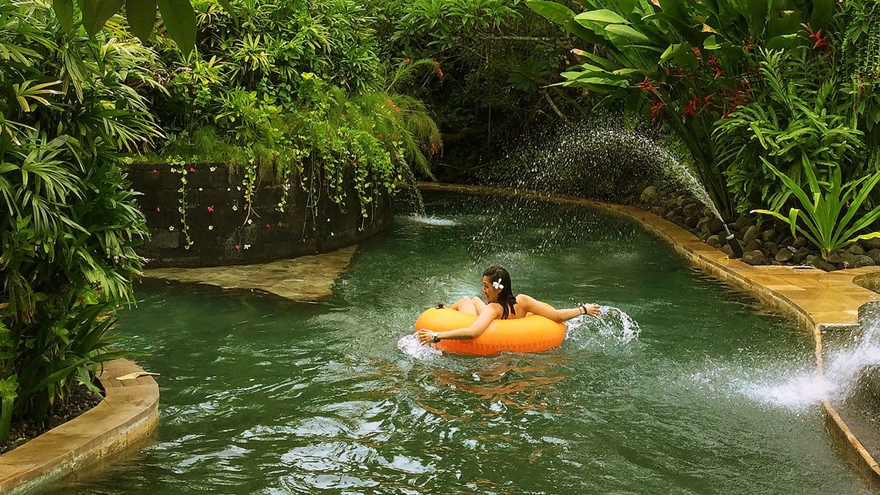 Guests floating peacefully along the Lazy River at Waterbom Bali