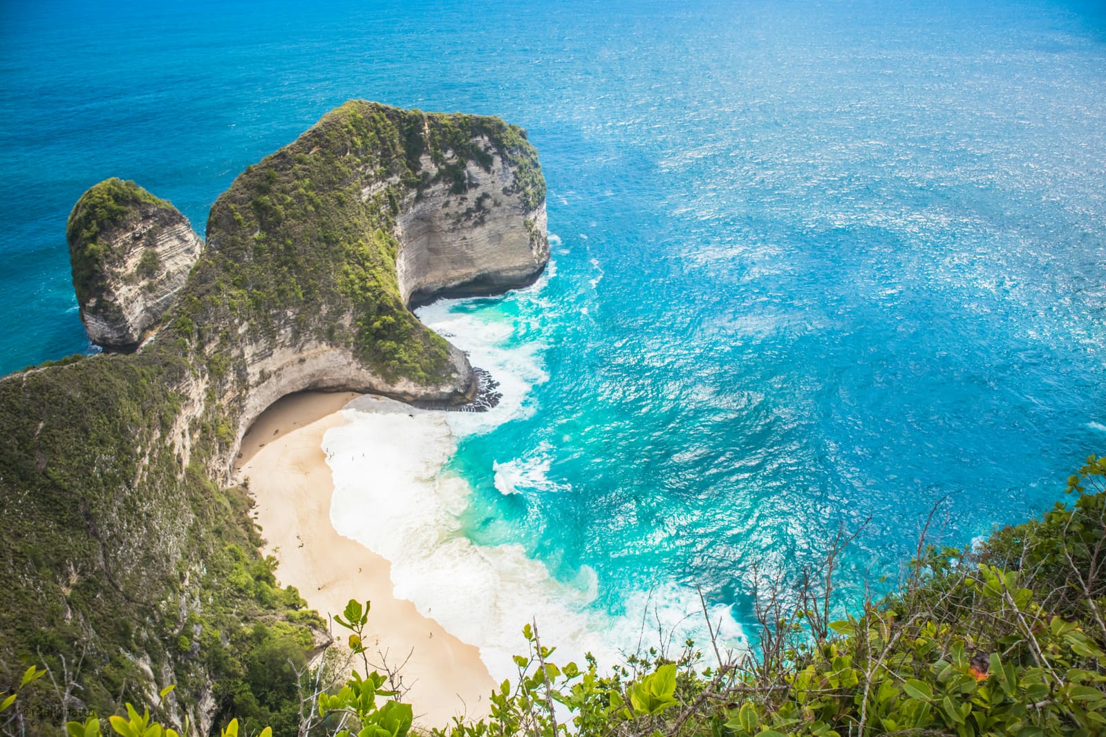 Nusa Penida’s rugged coastline and blue sea