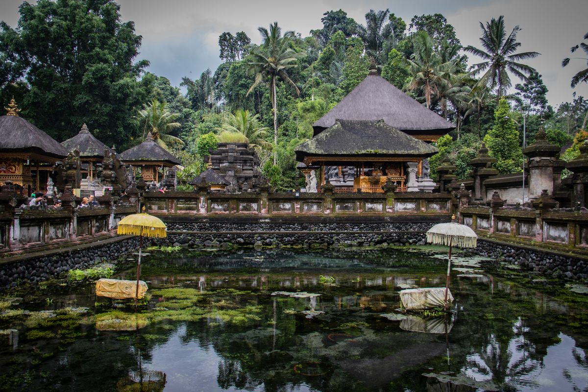 Tirta Empul Temple with holy spring water pool and traditional Balinese shrine